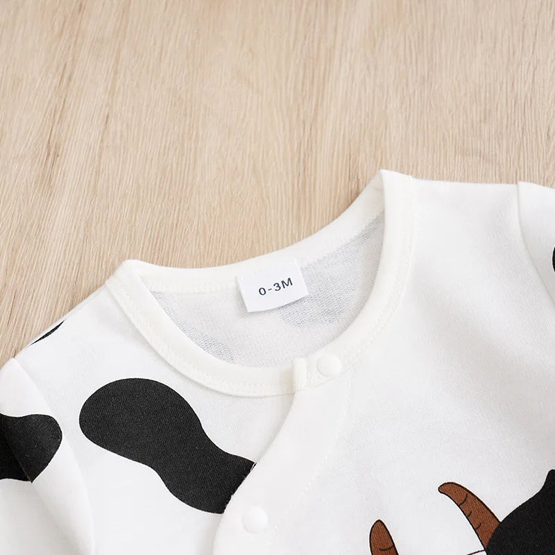 “Adorable Long-Sleeve Cow Print Baby Jumpsuit – Cozy, Stylish & Perfect for Spring and Autumn Play”
